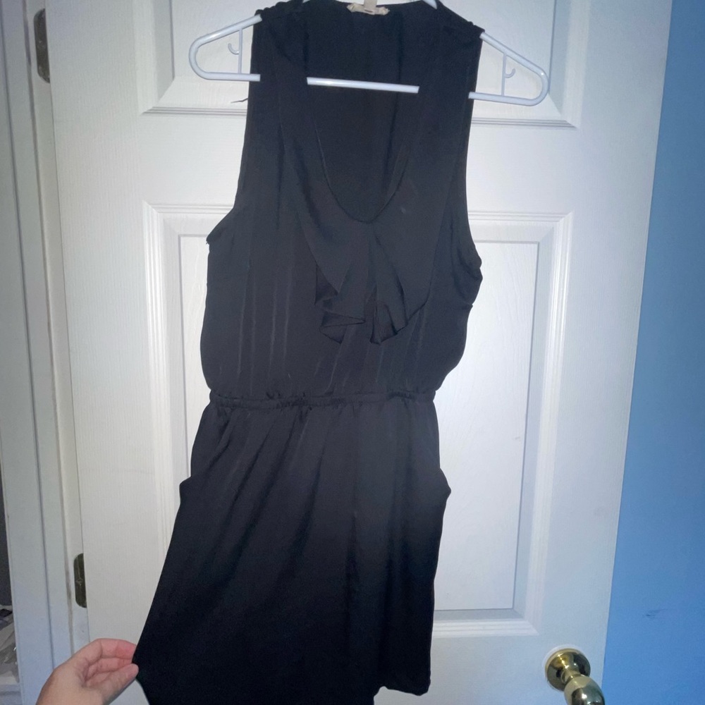 Black pleated mini dress with pockets